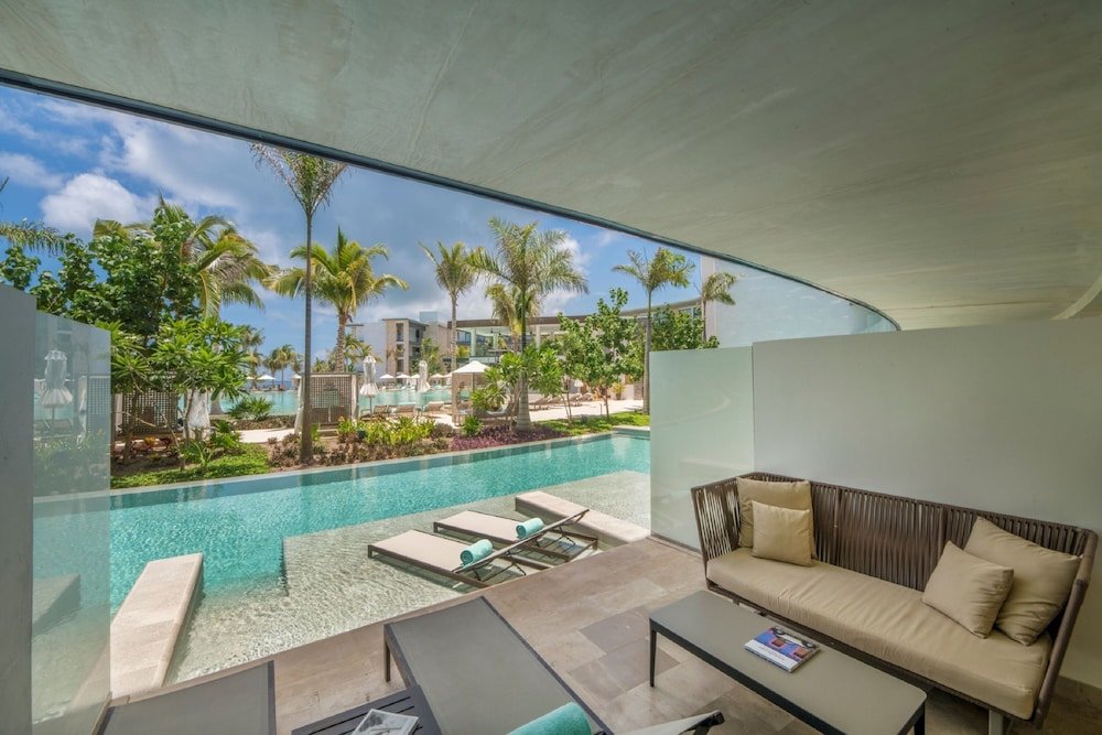 Suite Junior con salida directa parcial al mar — 4