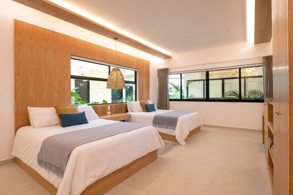Deluxe Quadruple Room — 4