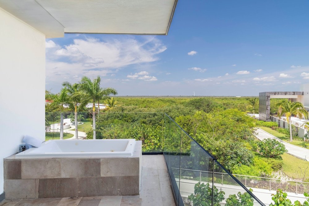 Junior Suite, 2 camas dobles, Partial vista al mar — 4