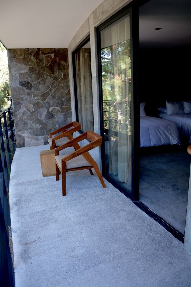 Habitación Junior, 2 camas dobles, vista al jardín — 2