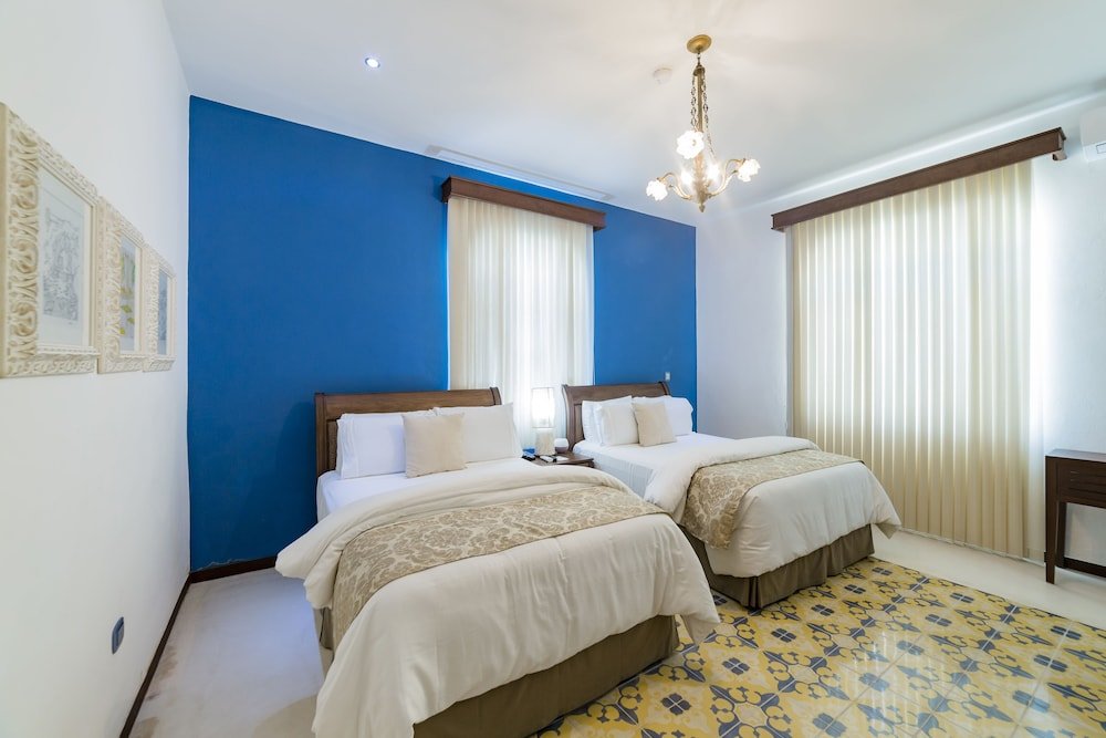 Habitación Deluxe Doble, 2 Camas Dobles — 7
